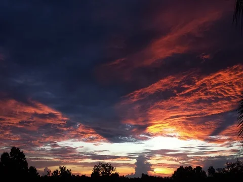 Fiery Sunset Time Lapse (2160p 29.97) Stock Footage 77166303