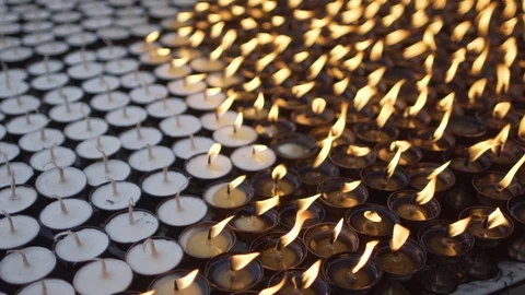 Fiery wave extends on the oil ritual lamps Stock Footage 107848364