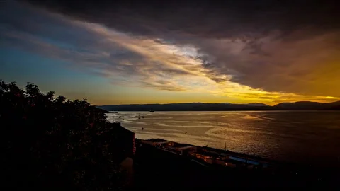 Fiery Weather Front Passes Down A River. Video stock 179379196