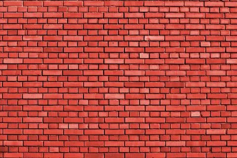Fiesta red brick wall background Stock Photos