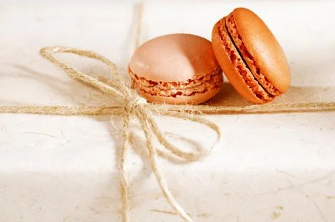 Fiestive macarons on gift present box, shaloow dof Stock Photos