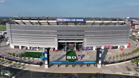 FIFA World Cup 2026 banner spans curved silver facade of MetLife Stadium in Stock Footage 340322575