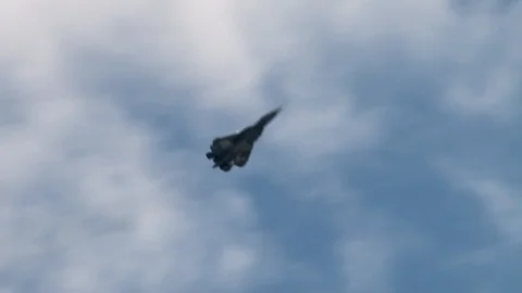 Fifth generation aircraft of Su-57 performs complex aerobatics. Video stock 106799990