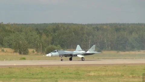 Fifth-generation Russian multi-purpose fighter Su-57 moves on runway. Stock Footage 120682381