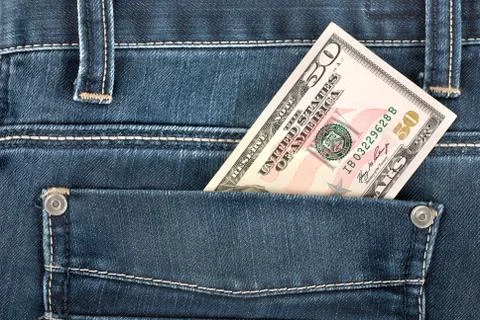 Fifty dollar in pocket Stock Photos