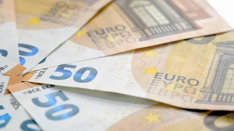 Fifty euro banknotes spinning on a table Stock Footage 101433612