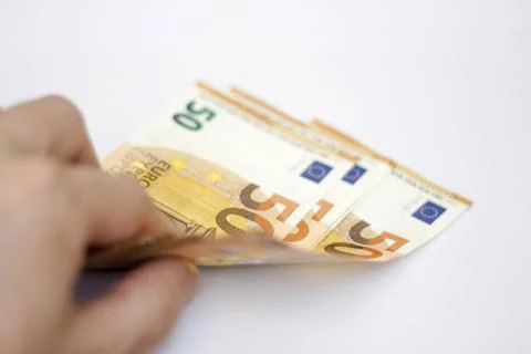 Fifty euro banknotes spread out isolated on white Stock Photos