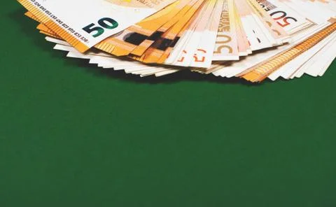 Fifty euro notes on green background. Stock-Fotos