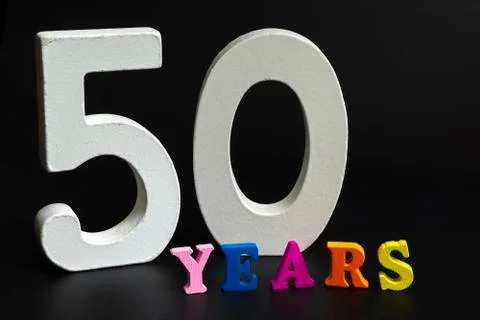Fifty figures on a black background. Stock Photos