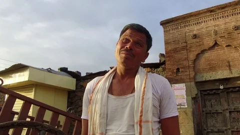 Fifty year old Indian man talking Stock Footage 77648770