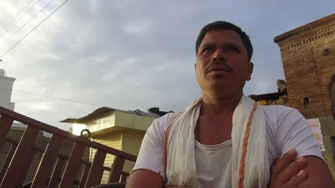 Fifty year old Indian man talking Stock Footage 77648868