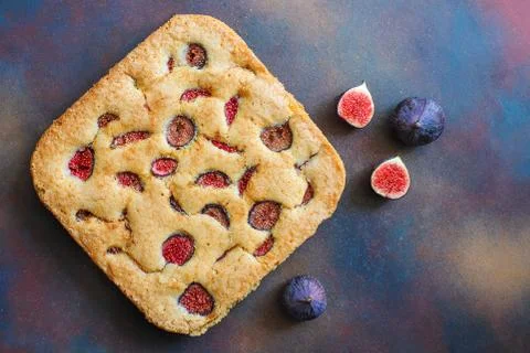 Fig cake with fresh figs on dark background Stock Photos