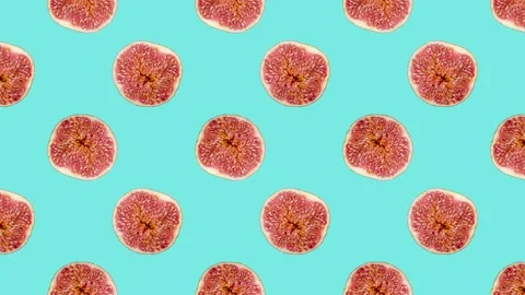 Fig slices in animated grid seamless loop pattern on a light blue background Stock Footage 222319742