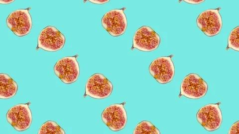 Fig slices in animated grid seamless loop pattern on a light blue background Stock Footage 222324223