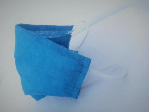 FIGHT AGAINST COVID USING MASK Stock Photos