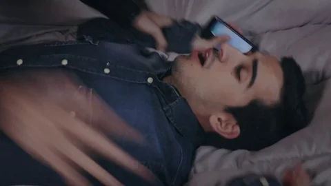 Fight between gay men on the bed , ending with a kiss Video stock 74721353