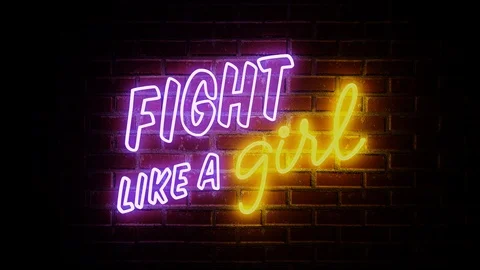 Fight like a girl neon sign Stock Footage