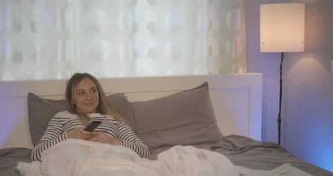 The fight for the remote control from the TV. Stock Footage 109638996