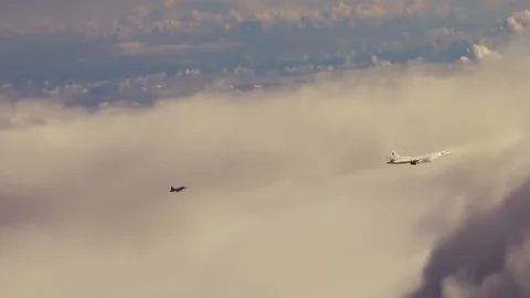 The fighter accompanies the bomber Stock Footage 123049007