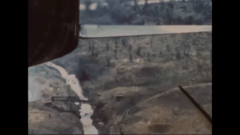 Fighter aircraft attacks the ground target during war - 1968 Stock Footage 103593528