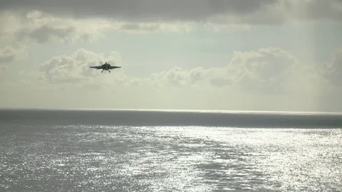 Fighter aircraft landing on deck of the USS Carl Vinson Stock Footage 117720563