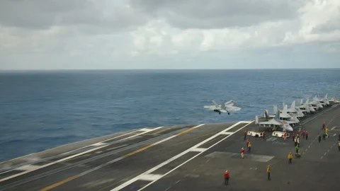 Fighter aircraft taking off from the USS Carl Vinson Stock Footage 117719199