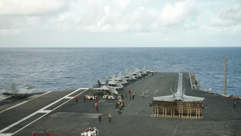 Fighter aircraft taking off from the USS Carl Vinson Stock Footage 117720388