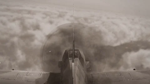 Fighter Airplane from WW2 in flight in the sky - POV vintage movie Stock Footage 102228916