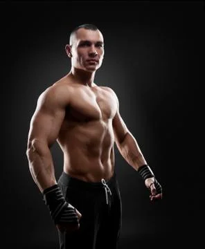 Fighter boxer on black background Stock Photos