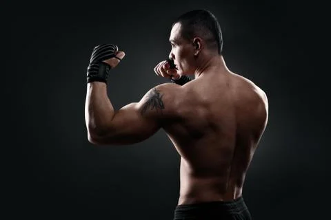 Fighter boxer on black background Stock Photos