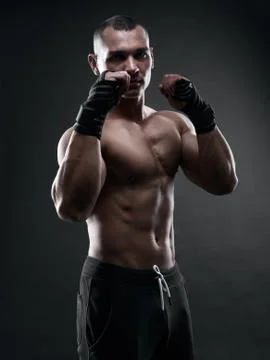 Fighter boxer on black background Stock Photos