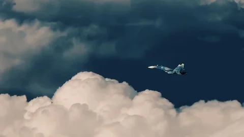 A fighter is chasing a bomber Stock Footage 123075607