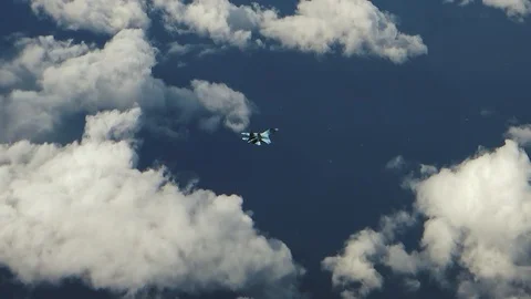 A fighter flies over a cloud Video stock 123120959