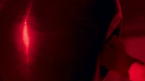 A fighter hits a punching bag with gloves during his training Stock Footage 141968220