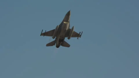 Fighter Jet Ascending in Blue Sky Stock Footage 334408083