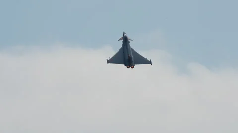 Fighter jet climbing into the clouds Stock Footage 336470729
