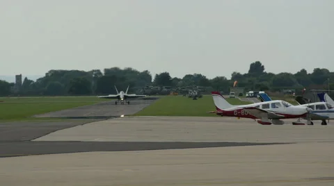 Fighter jet coming down runway Stock Footage 41342068