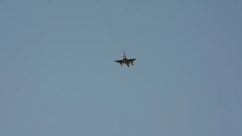 Fighter Jet Flying with Glowing Afterburner Stock Footage 334409571