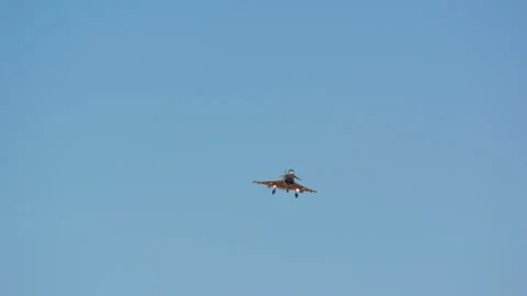 Fighter jet flying with landing gear down Stock Footage 341779671