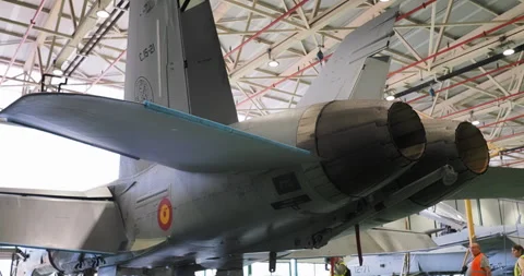Fighter Jet in Hangar - Rear View Tilt Up 스톡 동영상 329679993