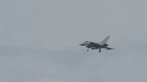 Fighter jet with landing gear extended Stock Footage 324120432
