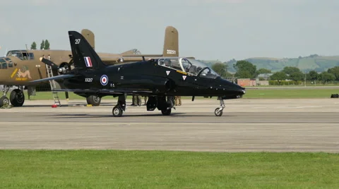Fighter jet moving down runway Stock Footage 41342309