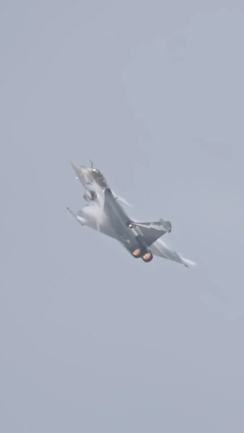 Fighter jet preforming high speed maneuvers showing its abilities Stock Footage 320318920