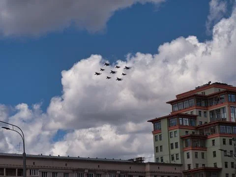 Fighter jets fly at ultra-low altitude over the city 스톡 사진