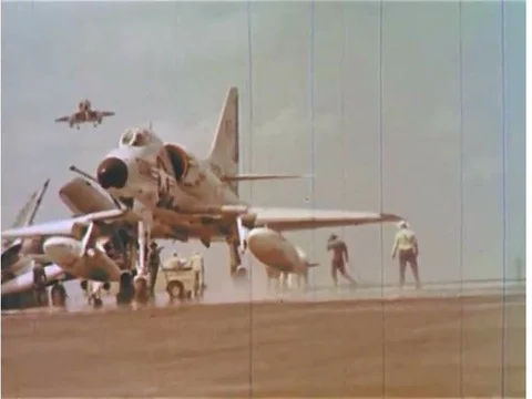 Fighter jets taking off from the deck of the USS Enterprise throughout the day Stock Footage 74946592