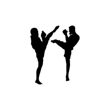 Fighter kicking silhouette in an intense combat fight, martial arts pose Illustrazione stock