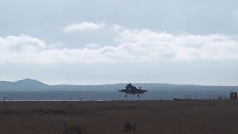 The fighter lands on the runway on two chassis Stock Footage 120369749