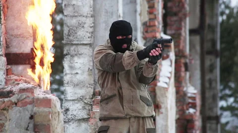 Fighter makes a pistol shot and falls Stock Footage 44786773