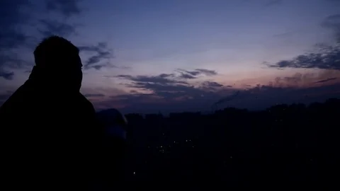 Fighter outdoot training silhouette with night city background Stock Footage 83464458