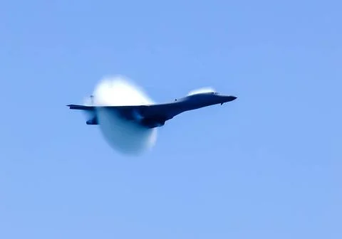 The fighter overcomes the sound barrier The fighter overcomes the sound ba... Stock Photos